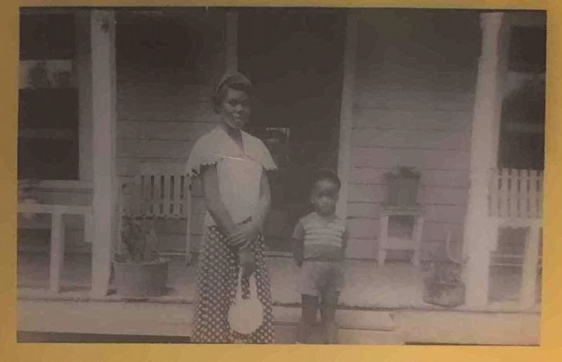 Ronand Kimber and a neighborhood friend stand in front onf his next door neighbor's house, circ 1953 image. Click for full size.