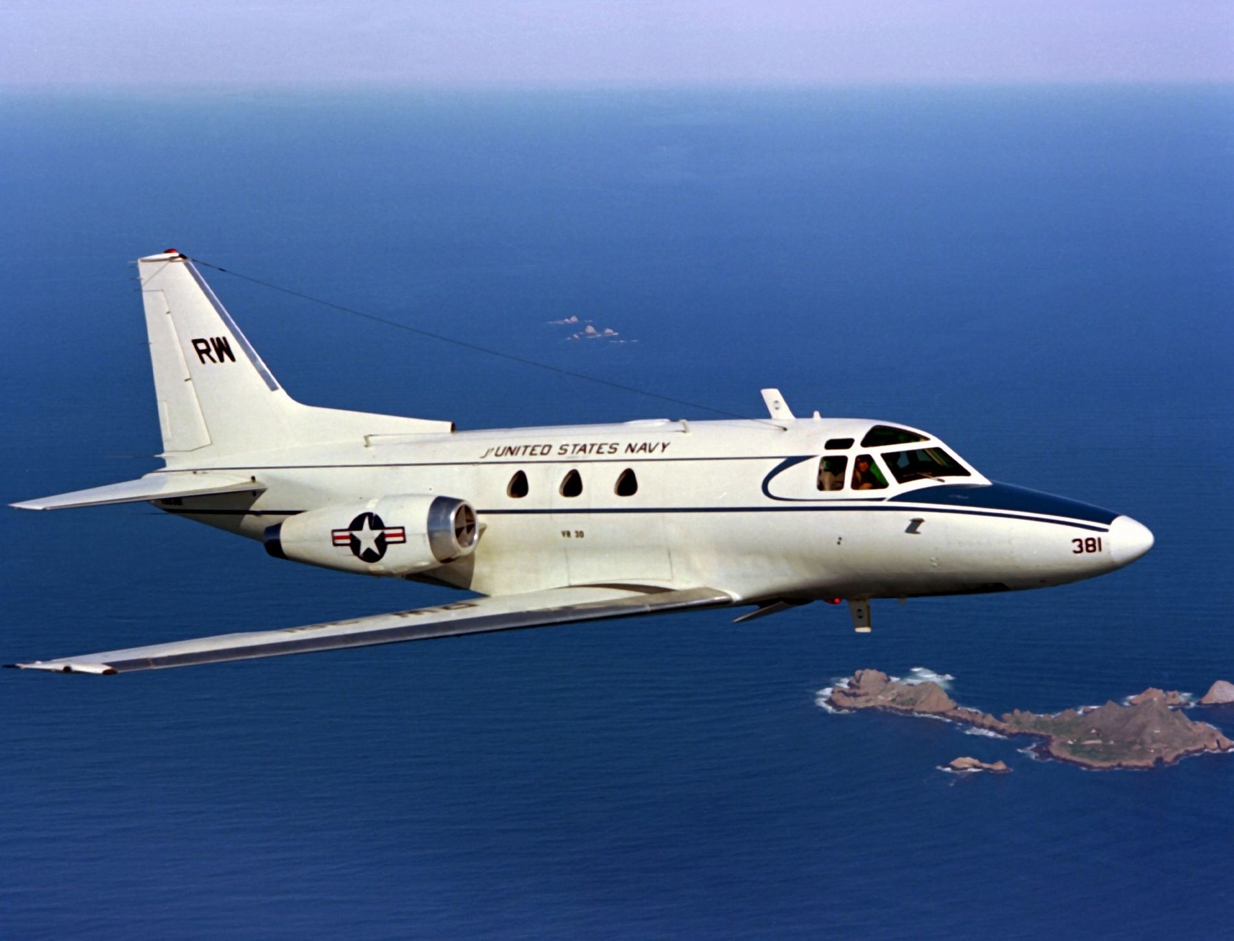 U.S. Navy North American CT-39E Sabreliner in flight image. Click for full size.