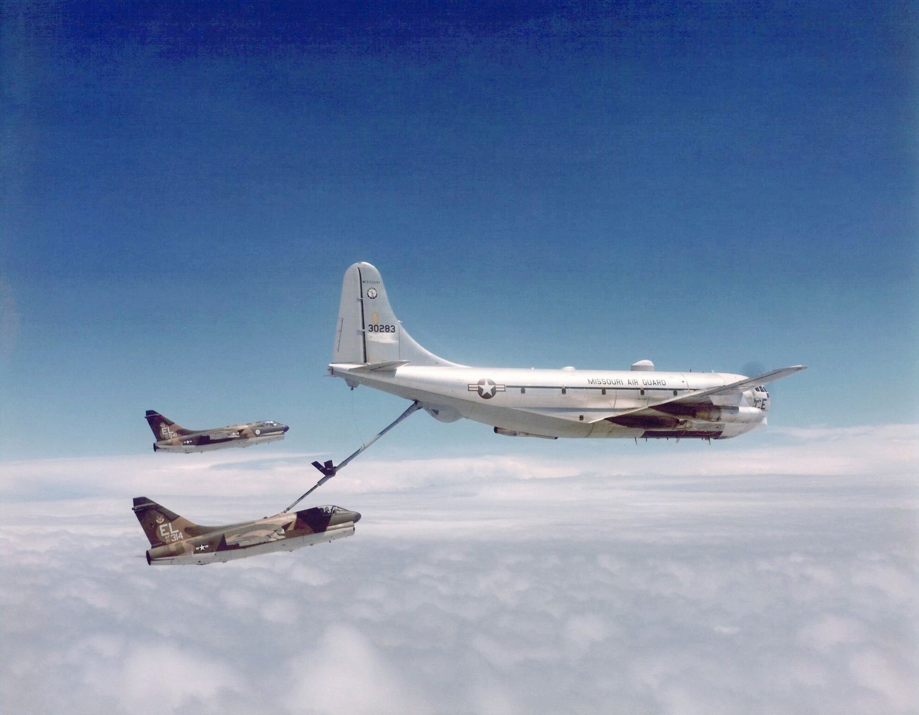 A Boeing KC-97L Stratofreighter refueling two U.S. Air Force Vought A-7D Corsair IIs. Click for full size. A Boeing KC-97L Stratofreighter refueling two U.S. Air Force Vought A-7D Corsair IIs image. Click for full size.
