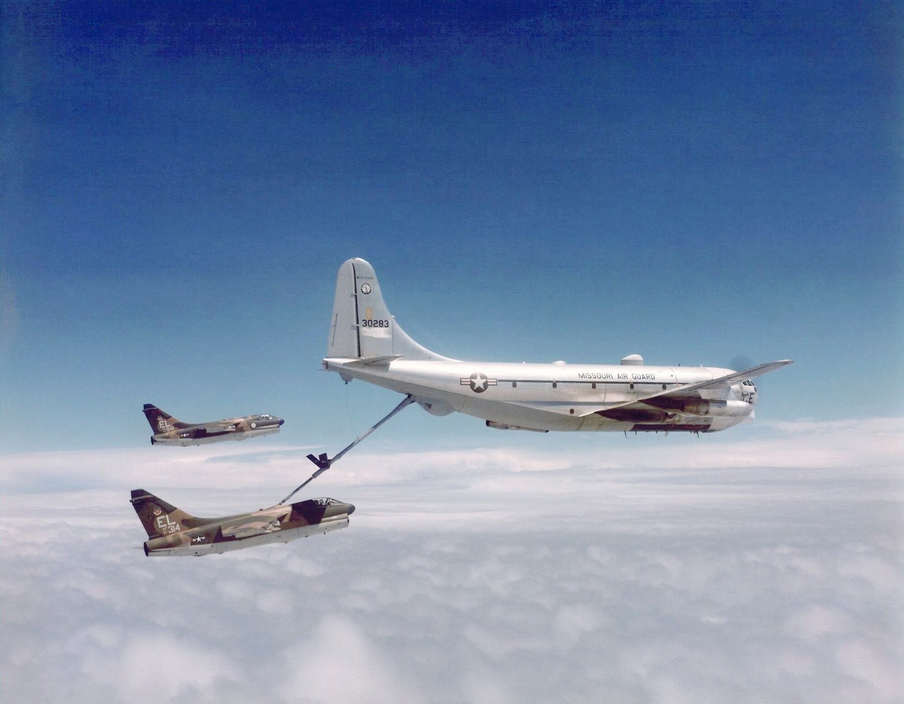 A Boeing KC-97L Stratofreighter refueling two U.S. Air Force Vought A-7D Corsair IIs image. Click for full size.