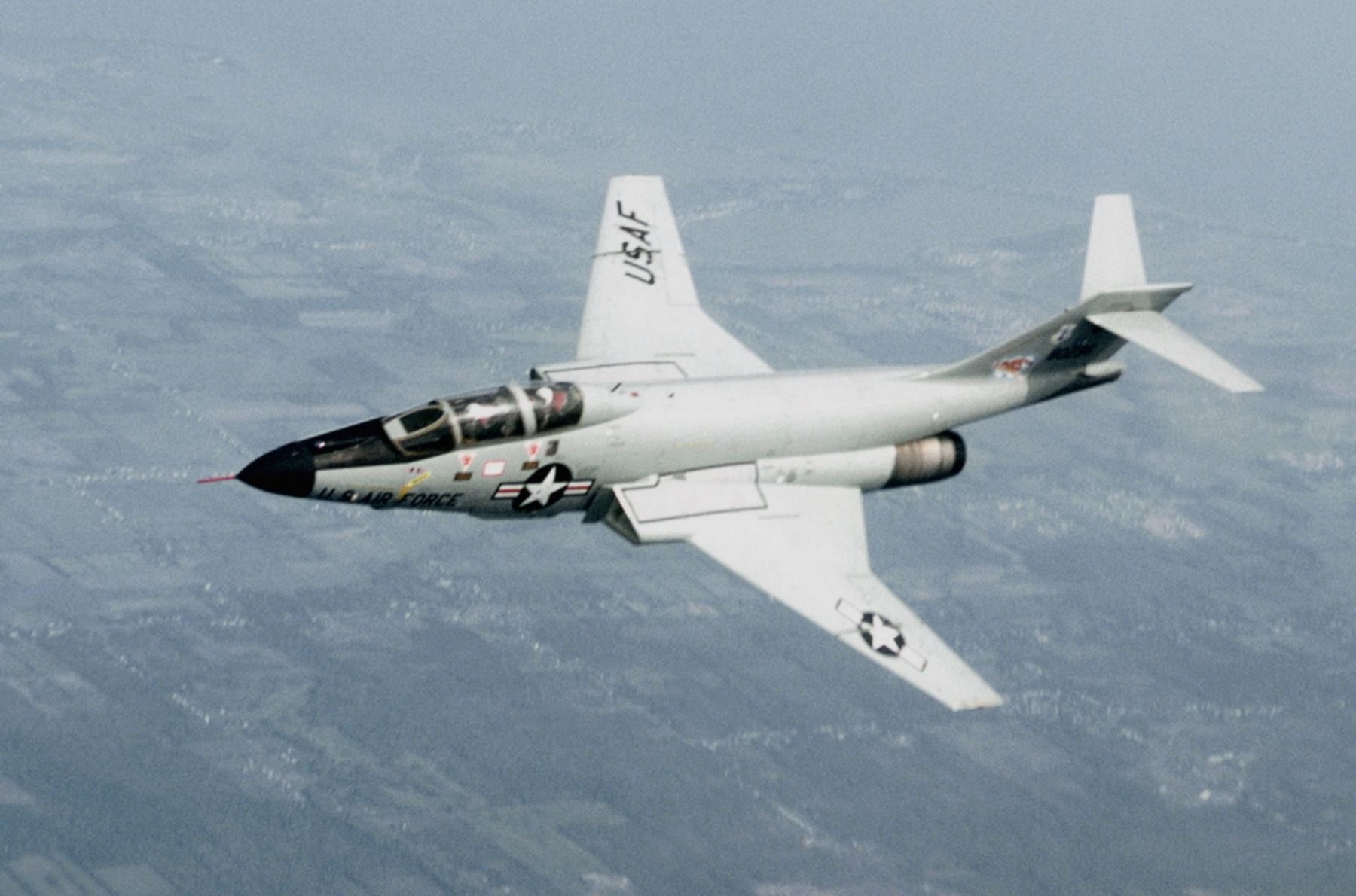 A U.S. Air National Guard McDonnell F-101B Voodoo aircraft banking in flight in 1978. image. Click for full size.