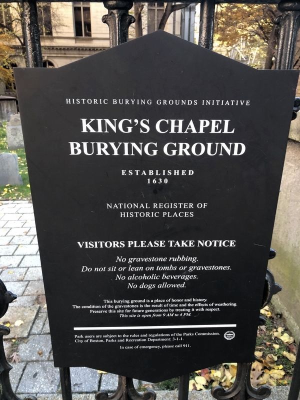 National Register of Historic Places sign hanging on the fence to the burying ground image. Click for full size.