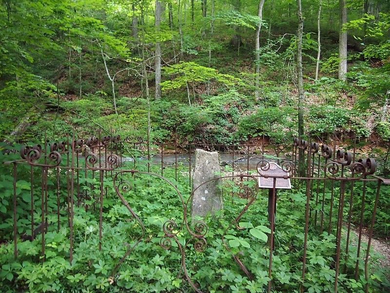 The Wilson Monument, enclosed by a small metal fence image. Click for full size.