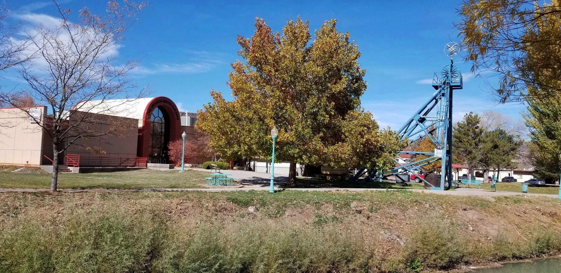 The Fannie Mine Hoisting Bucket is located under the Head Frame on the right side image. Click for full size.