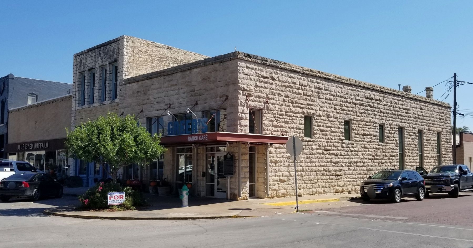 The view of the old Dawson Saloon building and marker from across the street image. Click for full size.