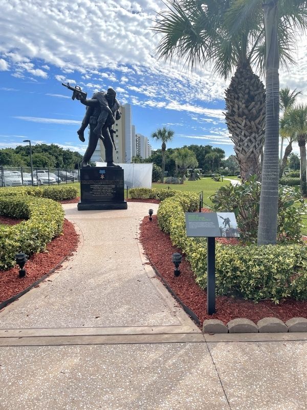 Although the statue reconstructs the actions of Medal of Honor recipient, Michael Thornton, carrying Marker image. Click for full size.