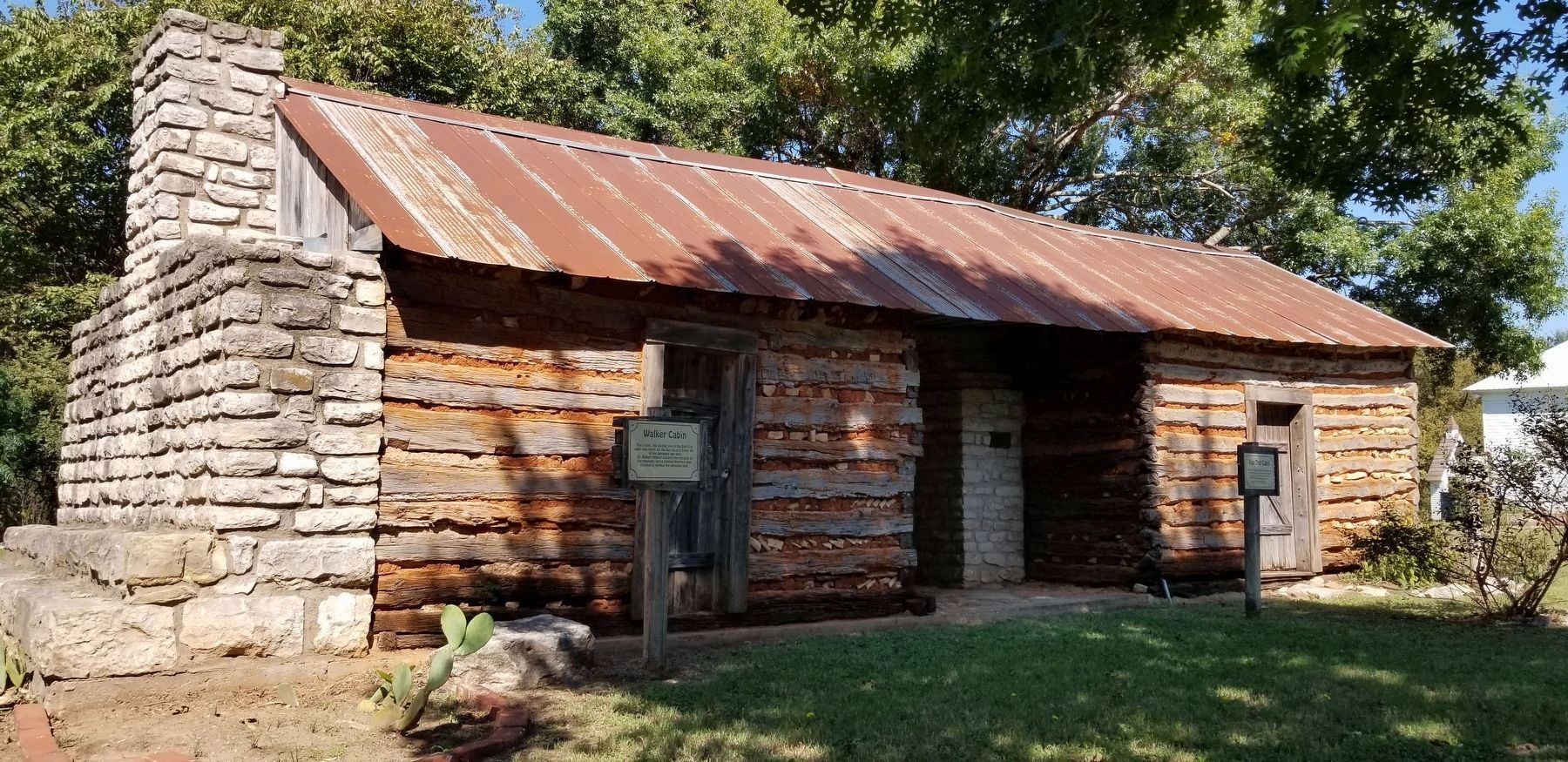 The Walker Cabin is connected to the Jones Cabin through the Dog Trot image. Click for full size.