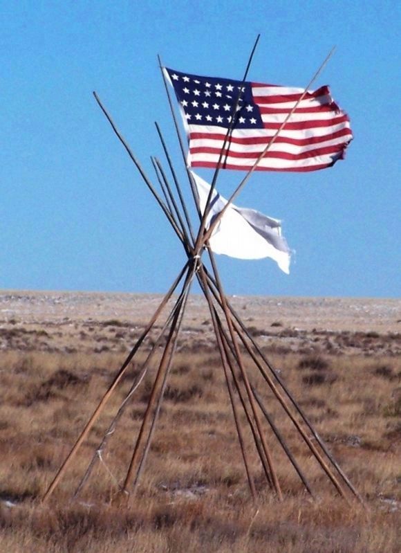 33-Star American Flag, white flag, atop a tipi frame at Sand Creek Massacre National Historic Site image. Click for full size.