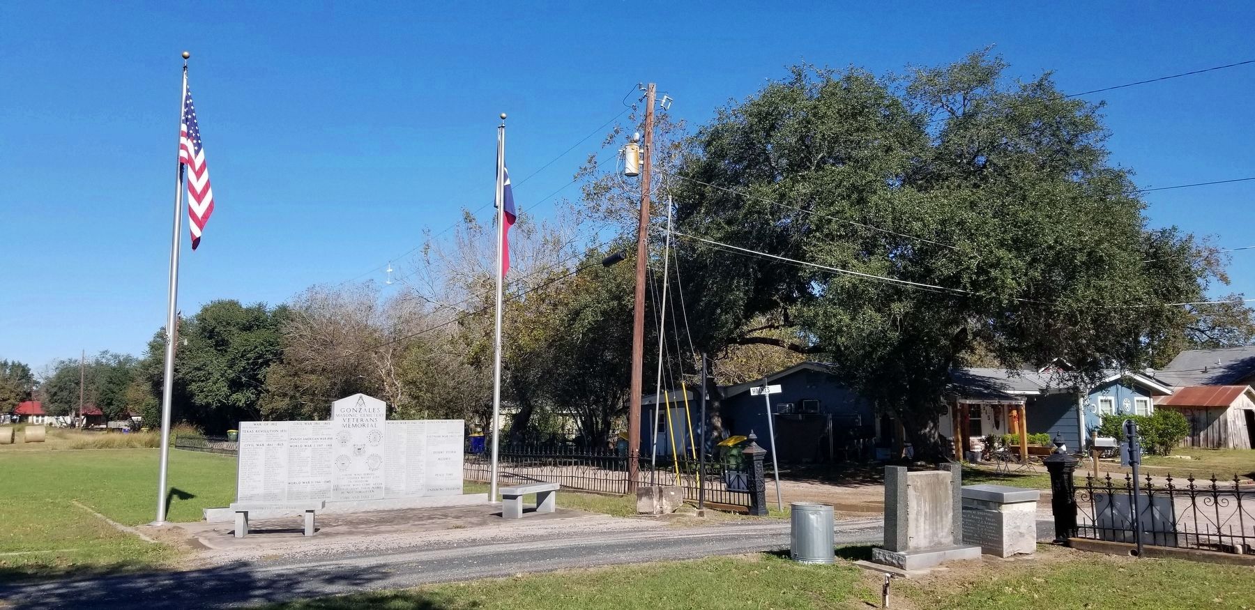 The view of the Gonzales Masonic Cemetery Veterans Memorial from the entrance to the cemetery image. Click for full size.