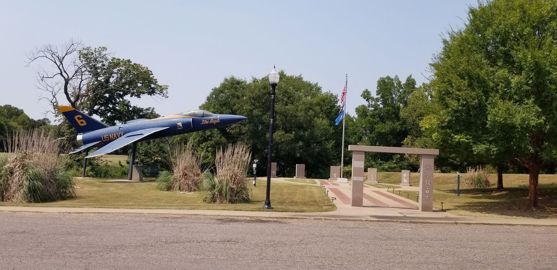 The view of the entrance to the memorial park from the street. Click for full size. The view of the entrance to the memorial park from the street image. Click for full size.
