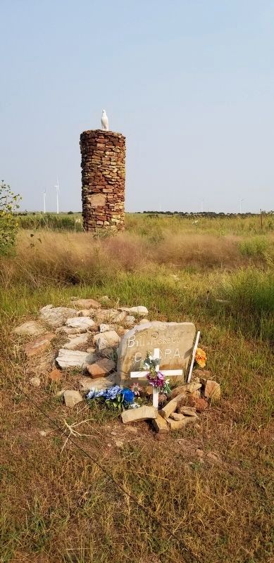 The gravestone of Bill Pickett and the stone cairn with White Eagle on top. Click for full size. The gravestone of Bill Pickett and the stone cairn with White Eagle on top image. Click for full size.