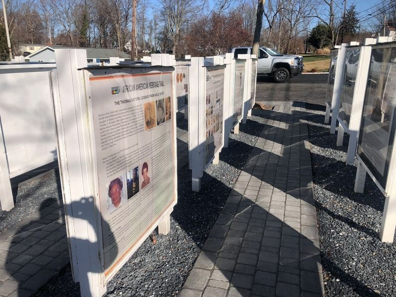 The Thomas Sisters: Legends from Holly Grove side of the marker image. Click for full size.