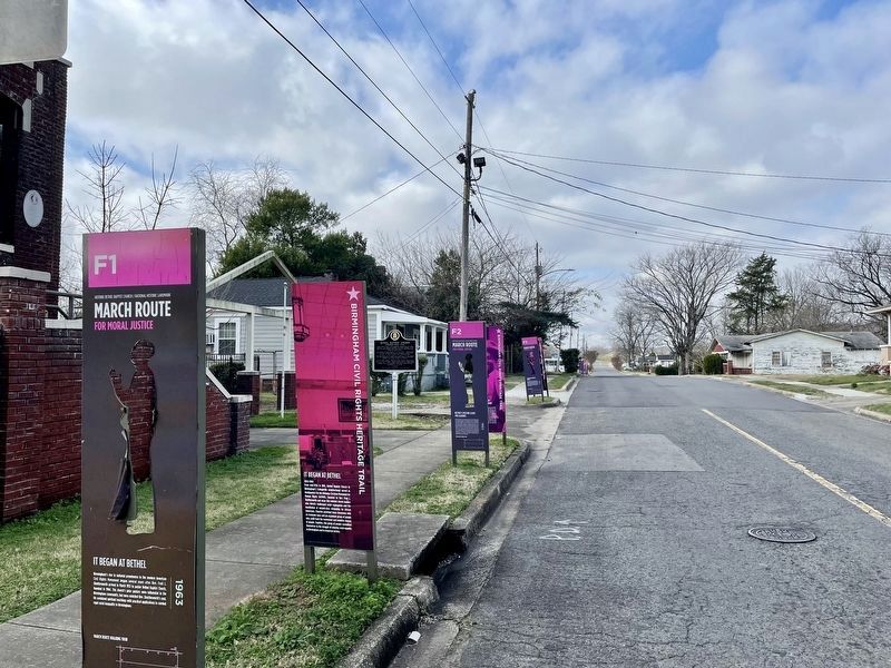 This marker is the 3rd set of markers in distance, by electricity pole. image. Click for full size.