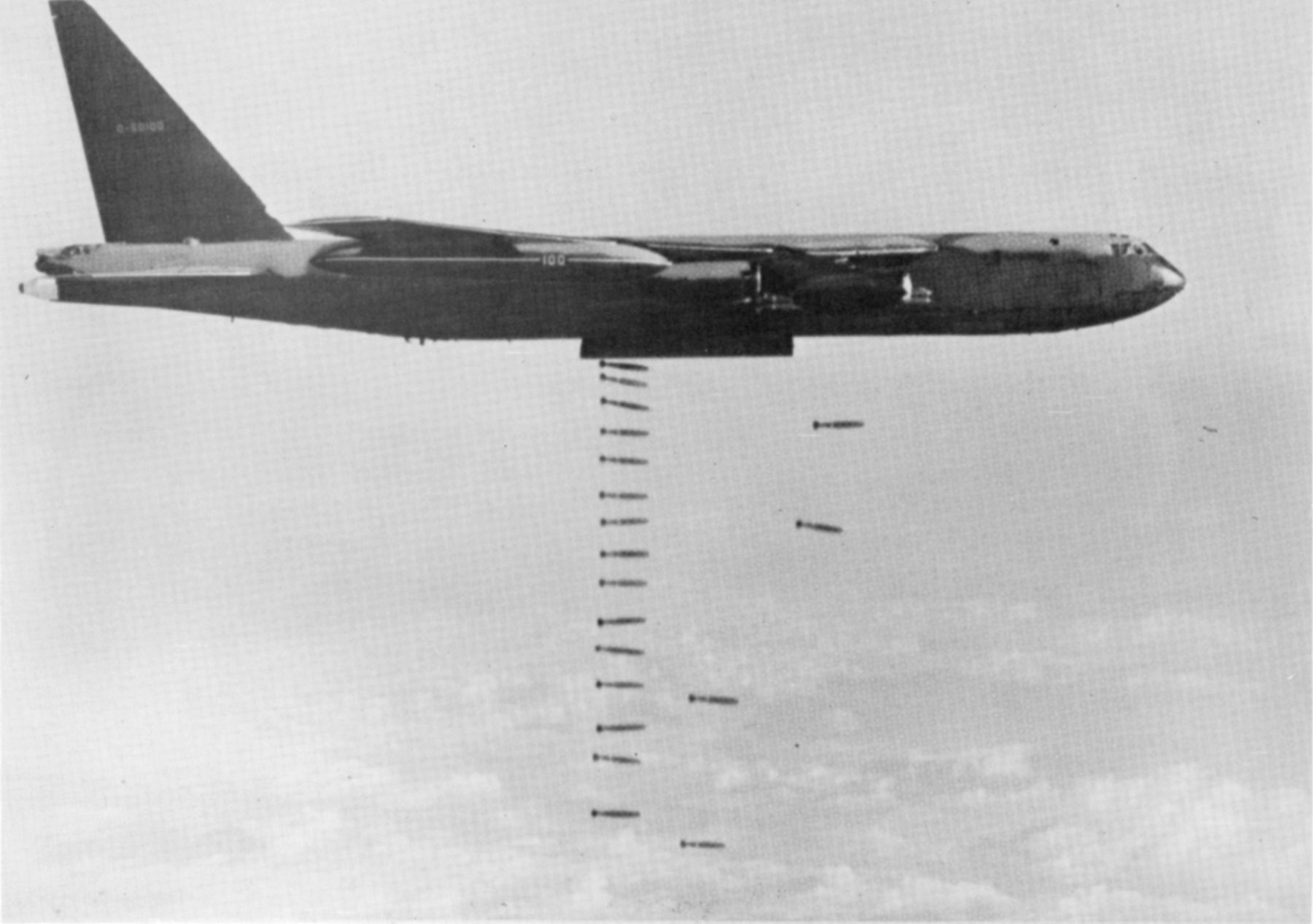 Boeing B-52D Stratofortress Bomber dropping bombs image. Click for full size.