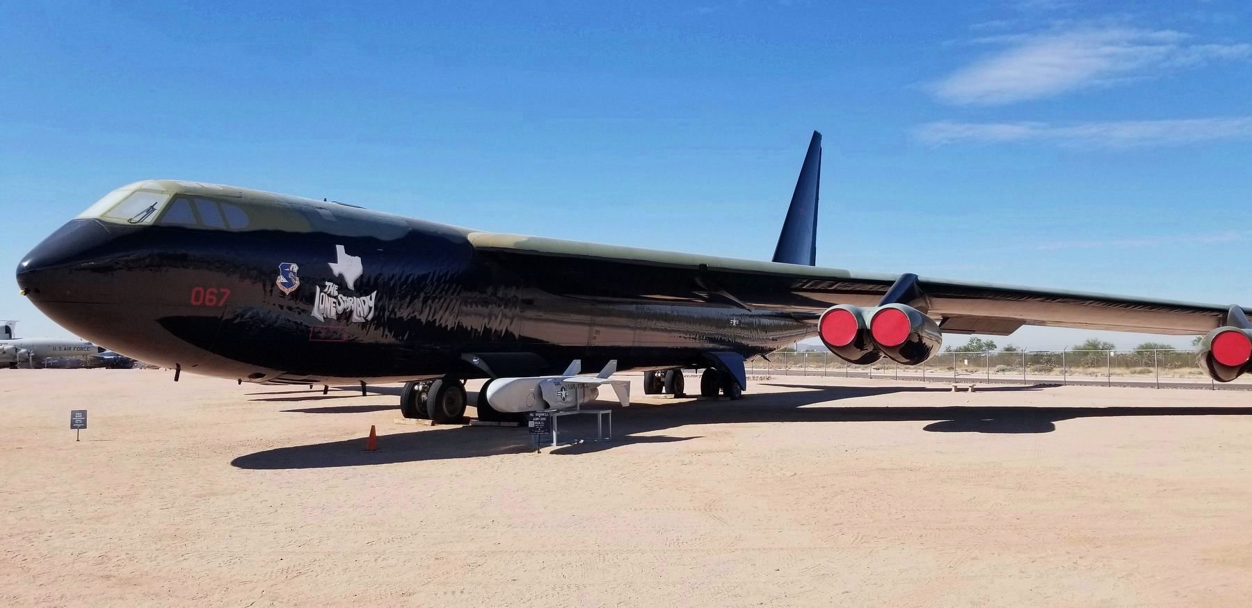 The Mc Donnell ADM-20C Quail Decoy Missile next to a B-52 Stratofortress strategic bomber image. Click for full size.
