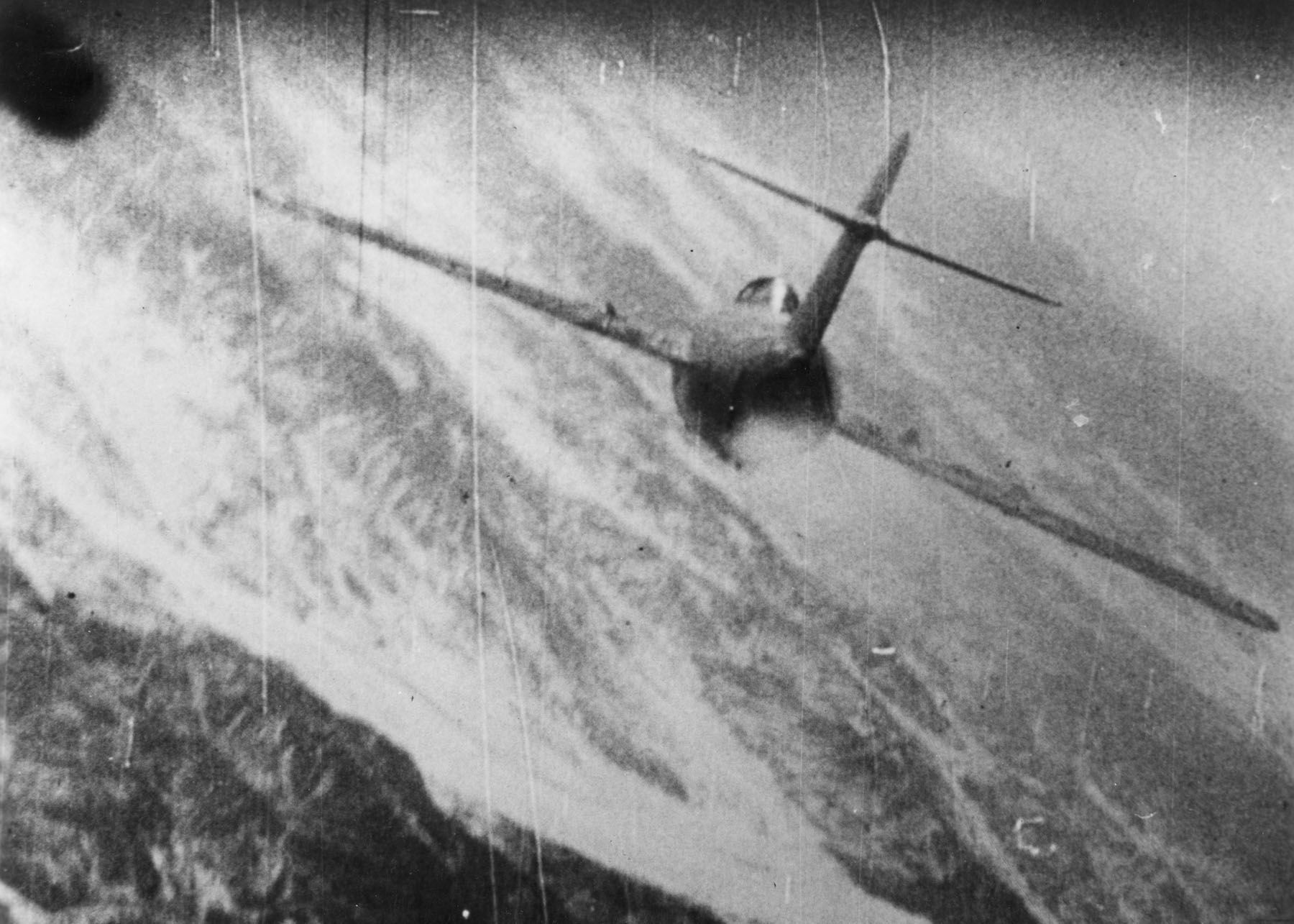 MiG-15 being hit over Korea image. Click for full size.