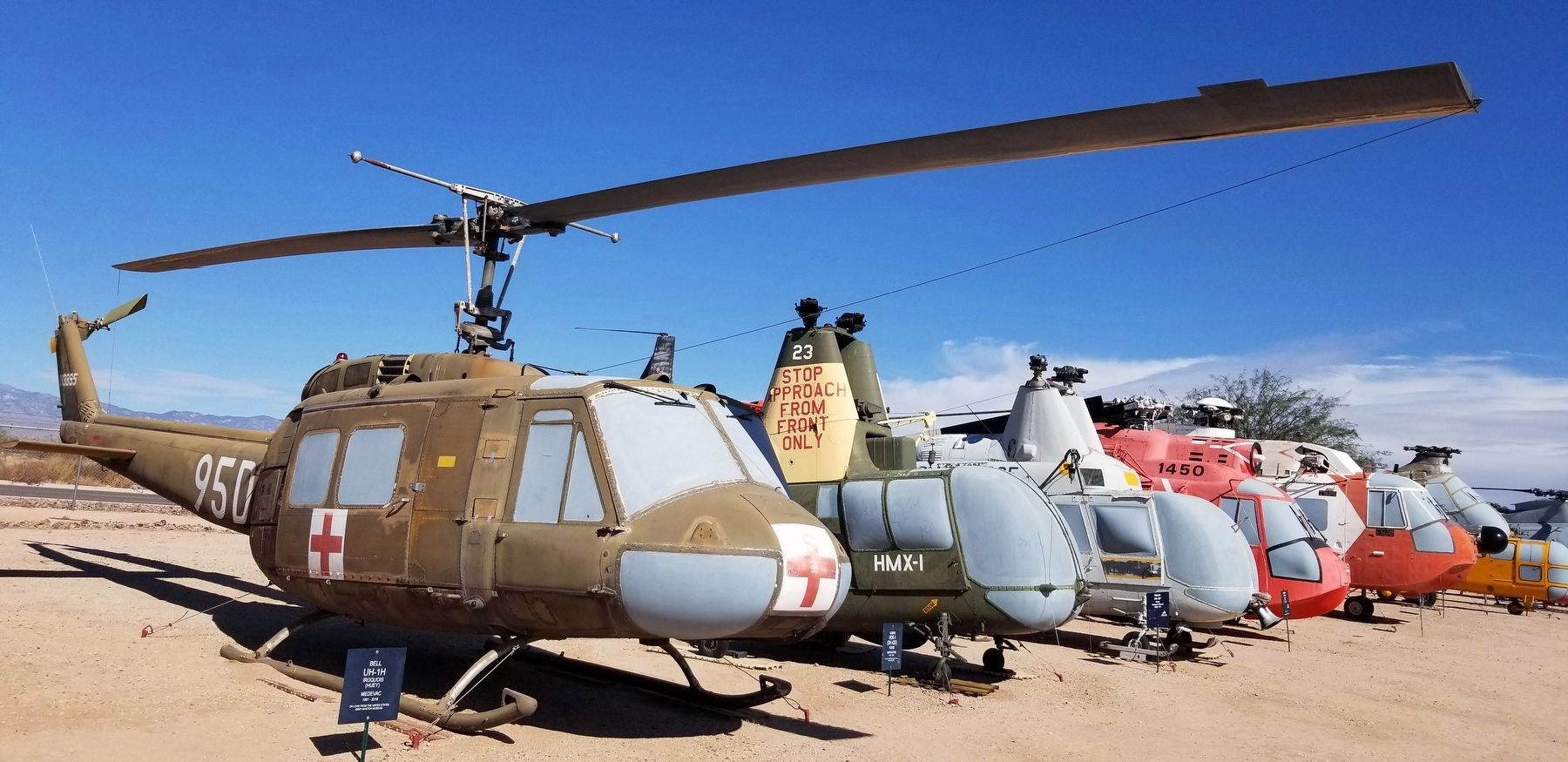 The Bell UH-1H Iroquois (Huey) with other helicopters at the Pima Air and Space Museum image. Click for full size.