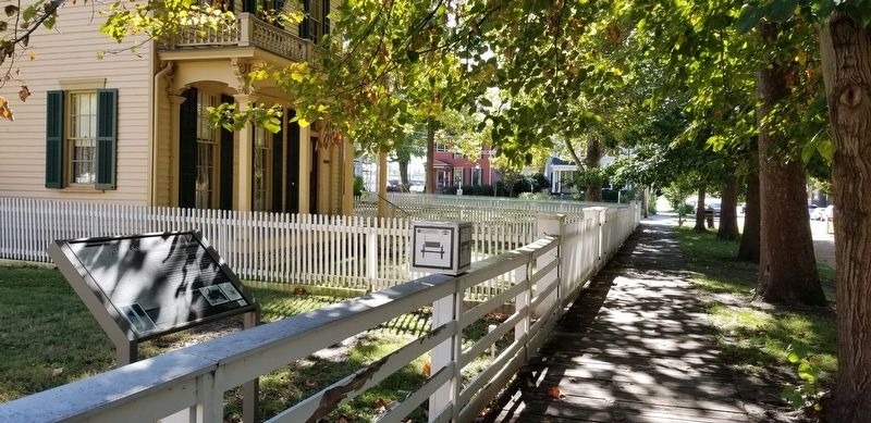 The view of the A <i>Lot </i>of Activism in the Neighborhood Marker from the street image. Click for full size.