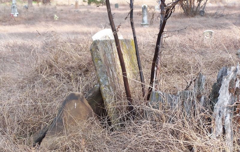 A nearby grave marked with a pile of stones. Click for full size. A nearby grave marked with a pile of stones image. Click for full size.