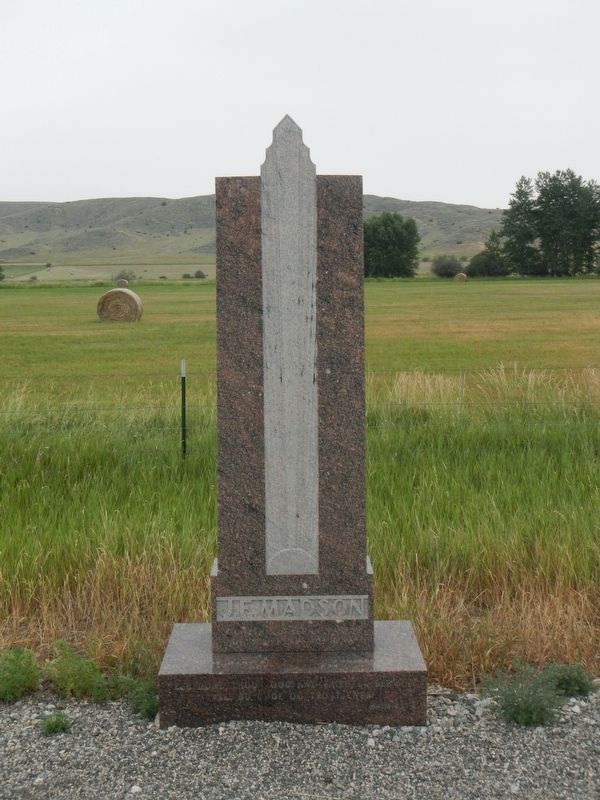 Monument to Rev. J.F. Madson image. Click for full size.