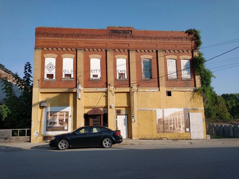 Godwin Brothers Storefront Marker on left. image. Click for full size.