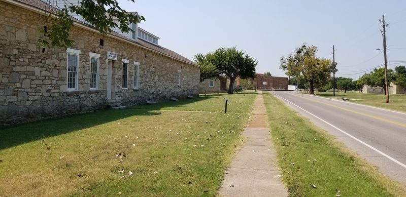 The view of the Commissary Storehouse and Marker from Randolph Road. Click for full size. The view of the Commissary Storehouse and Marker from Randolph Road image. Click for full size.