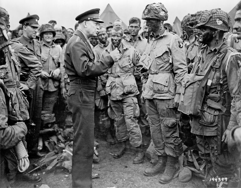 General Dwight D. Eisenhower addresses American paratroopers prior to D-Day. Click for full size. General Dwight D. Eisenhower addresses American paratroopers prior to D-Day image. Click for full size.