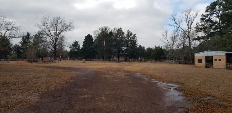 The view of the cemetery and marker from the street. Click for full size. The view of the cemetery and marker from the street image. Click for full size.