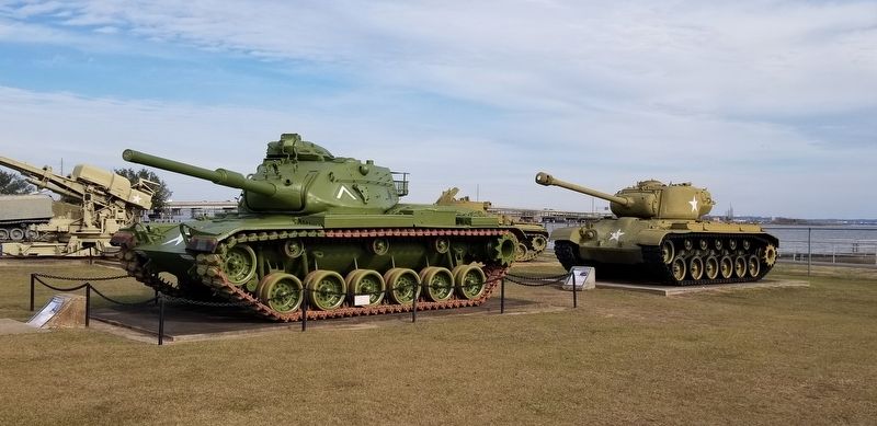 The M60A1 tank is on the left and the M26 Pershing is on the right image. Click for full size.