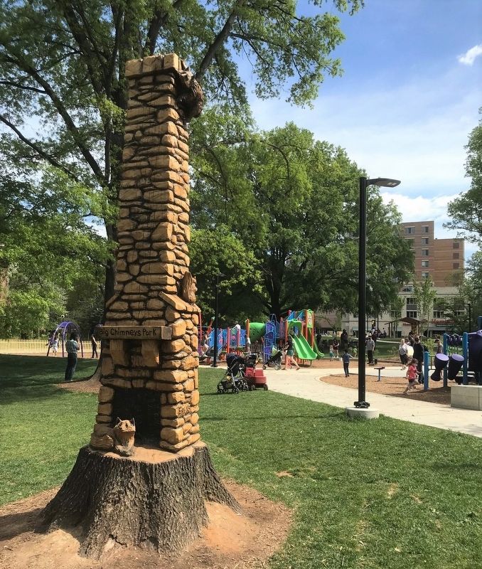 Big Chimneys park tree stump sculpture at the south end of the park. image. Click for full size.