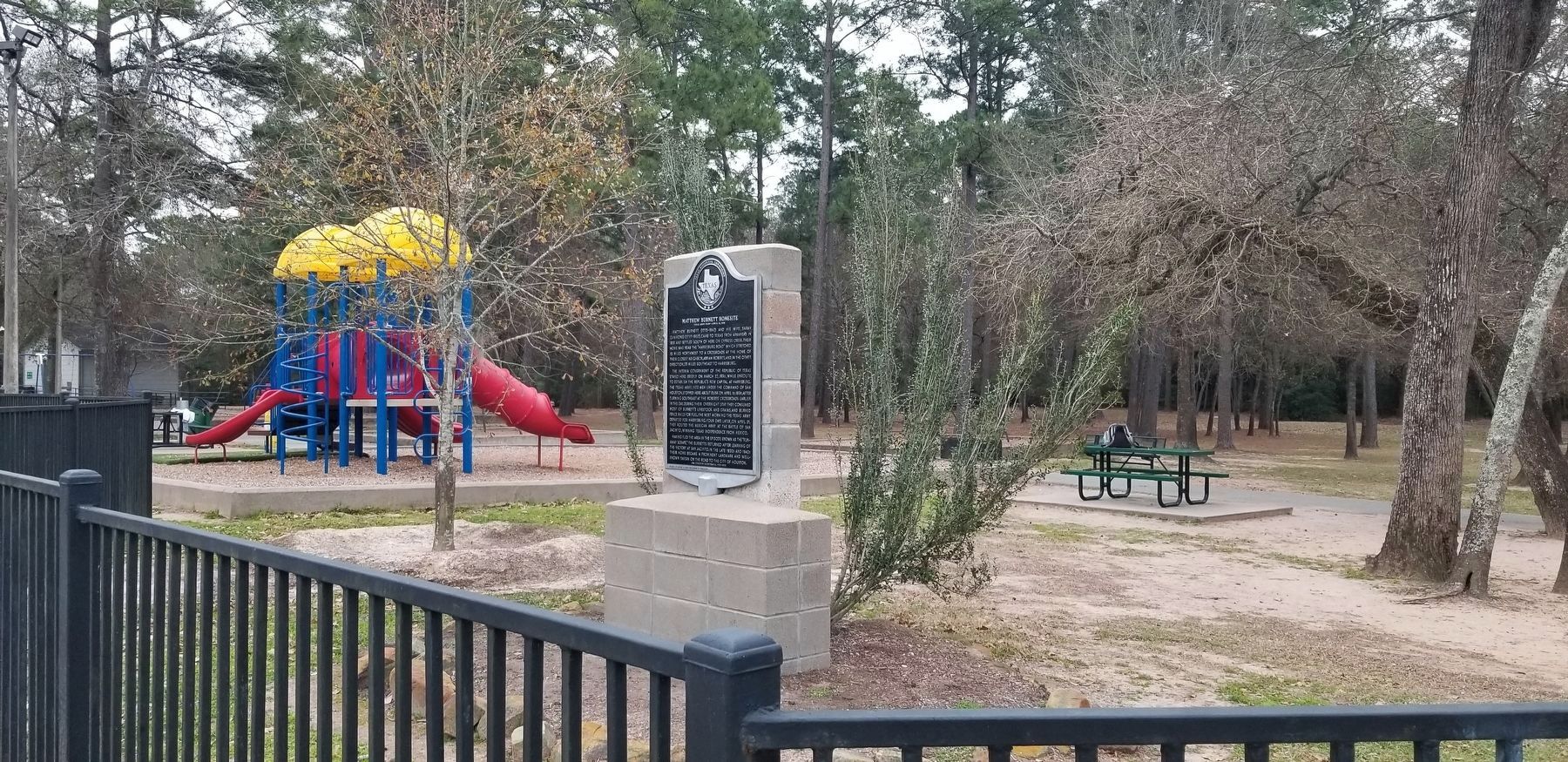 The view of the Matthew Burnett Homesite Marker from the parking lot of the park image. Click for full size.