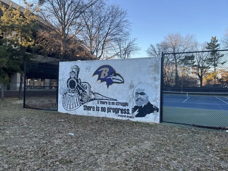 Nearby mural featuring Frederick Douglass. Click for full size. Nearby mural featuring Frederick Douglass image. Click for full size.