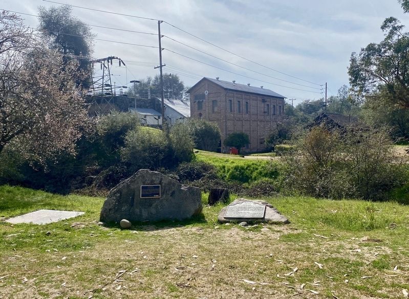 Original Folsom Hydroelectric Plant Marker - wide view, with powerhouse in background image. Click for full size.