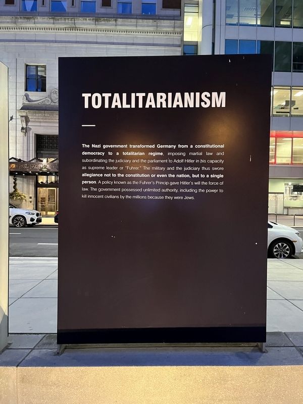 Totalitarianism side of the marker image. Click for full size.
