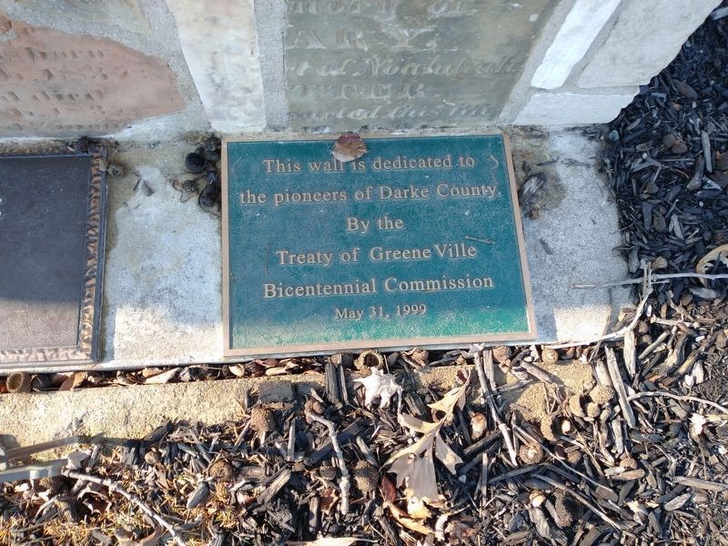 Dedication plaque on the site image. Click for full size.