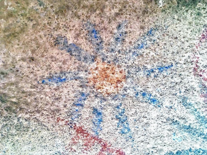 Blue Sunburst Petroglyph image. Click for full size.