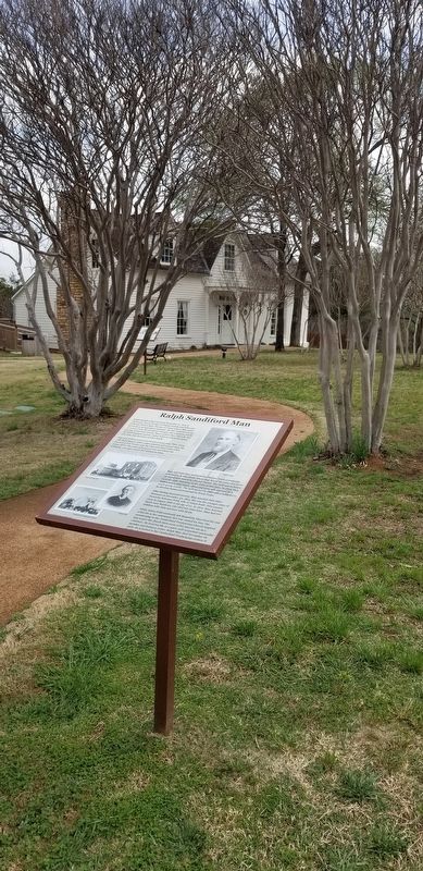 The Ralph Sandiford Man Marker in front of the Man House image. Click for full size.