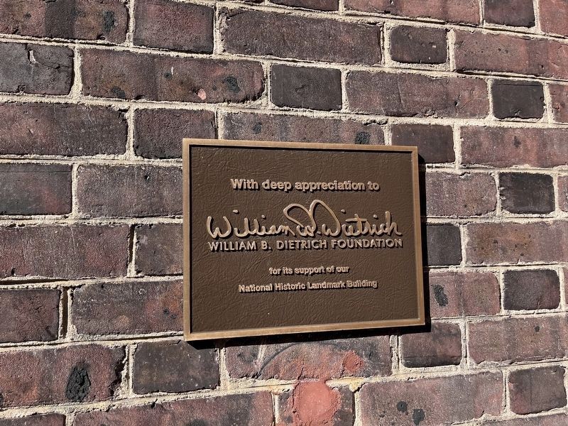 Dedication plaque for the building image. Click for full size.