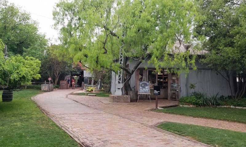 The marker is located at the right side of the entrance to the Gristmill River Restaurant & Bar image. Click for full size.