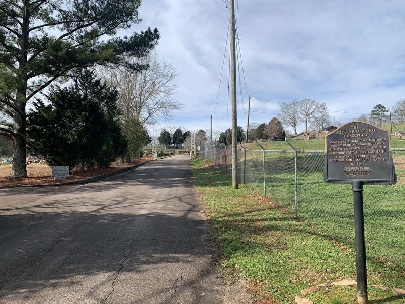 The City of Oxford Cemetery Marker looking west toward cemetery at end of road image. Click for full size.