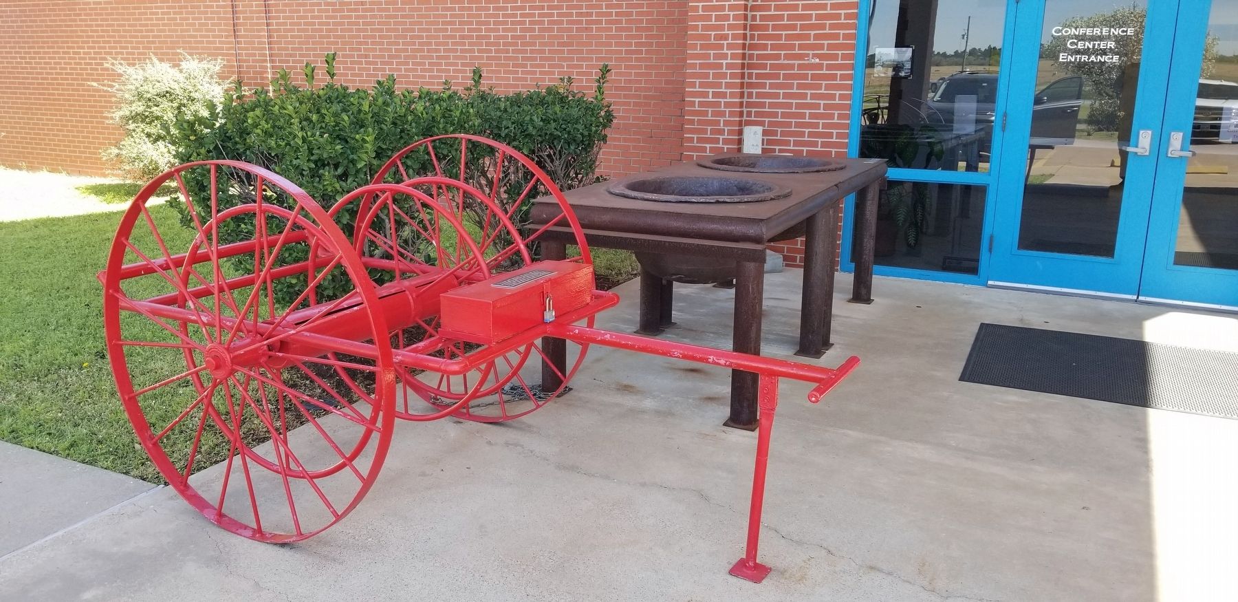 The Fire Hose Carts and Marker with washing pots behind them image. Click for full size.