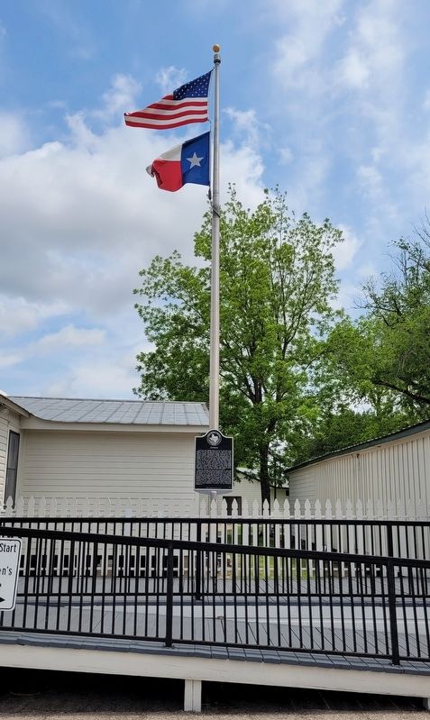 The Cypress Marker in front of the Juergen�s Hall and Store image. Click for full size.