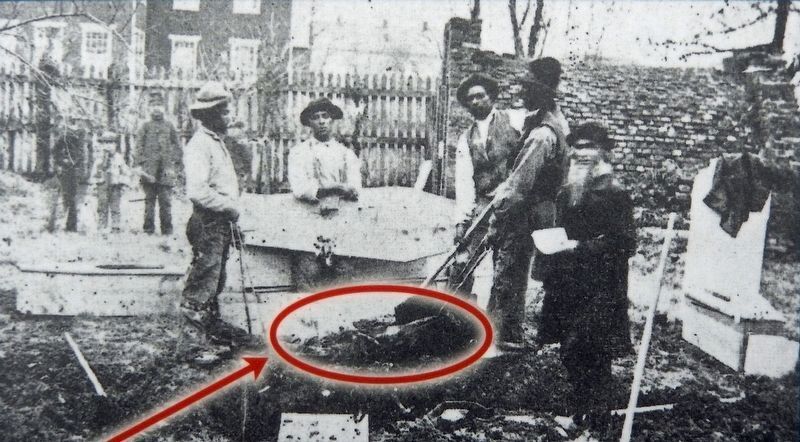 Marker detail: Dead soldier being removed for relocation image. Click for full size.
