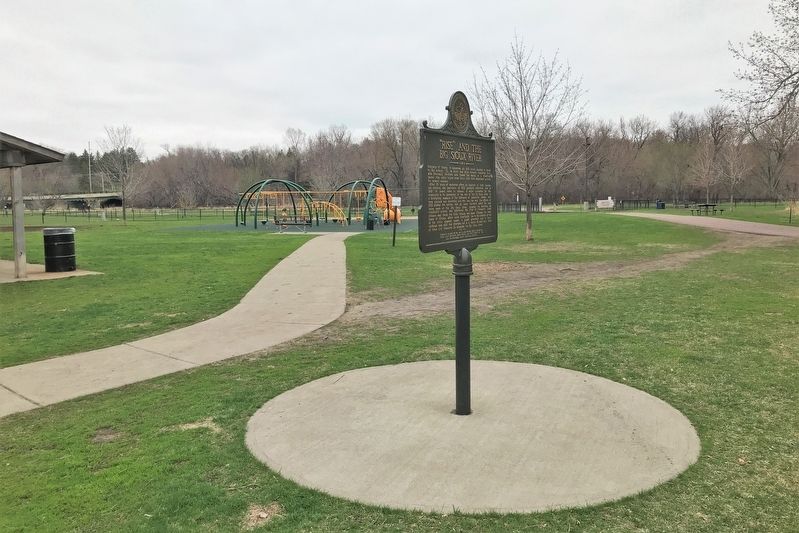 "RISE" and the Big Sioux River Marker in Spencer Park image. Click for full size.