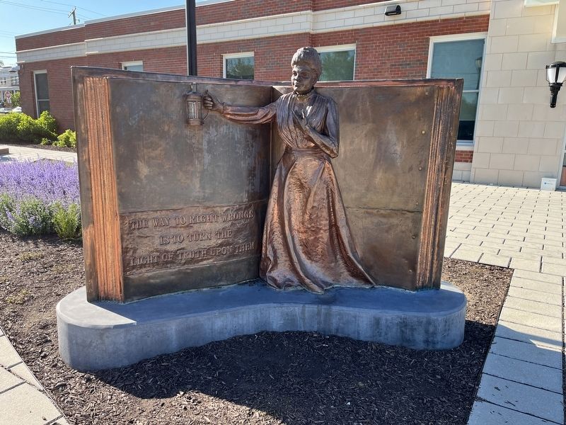 Ida B. Wells statue on the grounds of the school image. Click for full size.