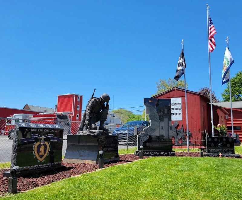 Veterans Memorials Outside the Mountaineer Military Museum image. Click for full size.