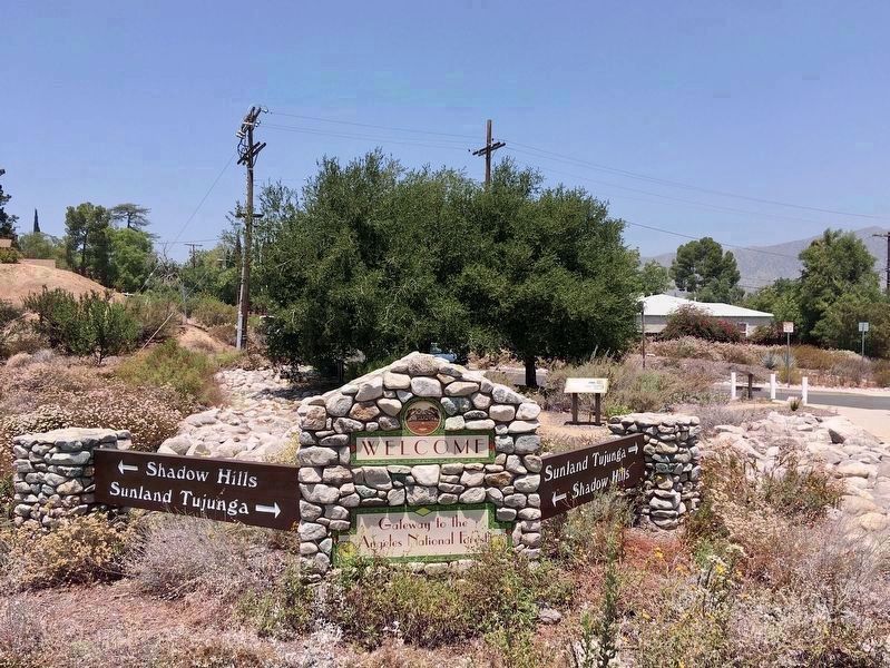 �Welcome� Sign Near Street Corner image. Click for full size.