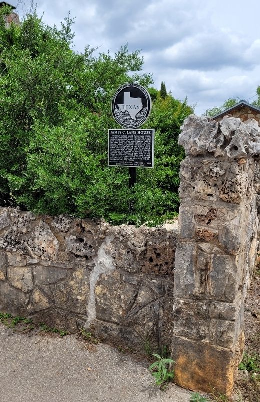 The James C. Lane House Marker at the corner of the walled fence. Click for full size. The James C. Lane House Marker at the corner of the walled fence image. Click for full size.