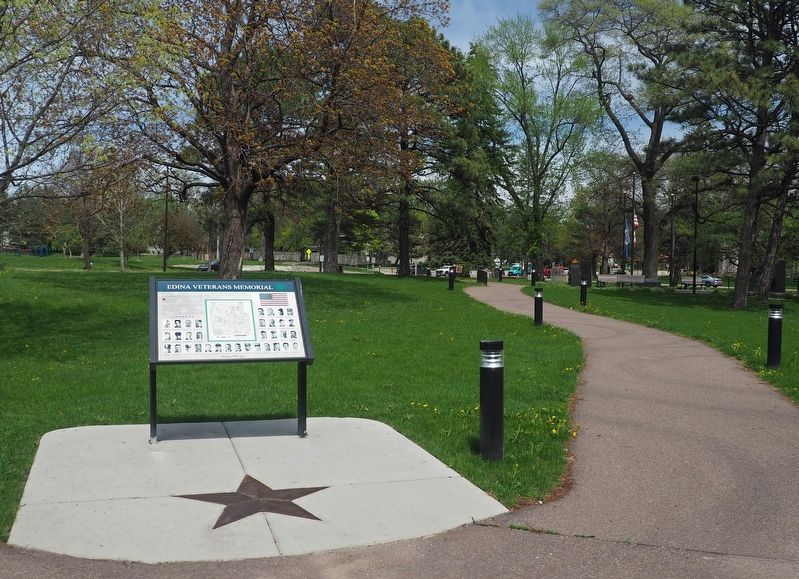 Marker off the path leading to the Edina Veterans Memorial image. Click for full size.
