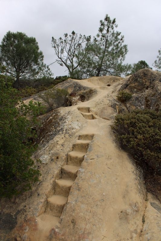 Sandstone steps carved by the CCC leading down to Sentinel Rock image. Click for full size.